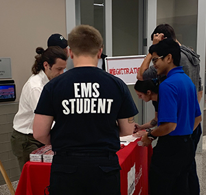 image of back of individual wearing a black shirt with