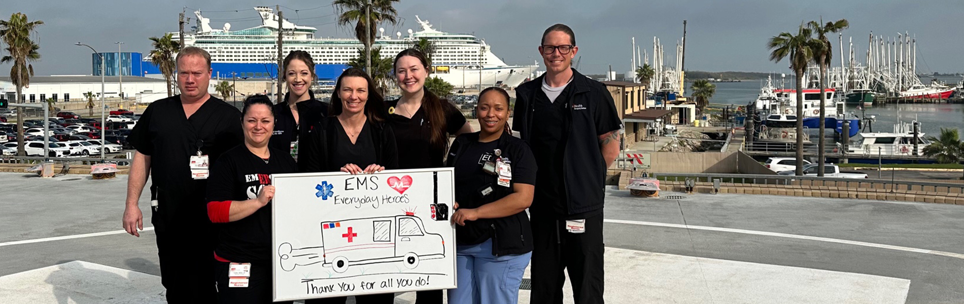 UTMB Health emergency staff hold a thank you sign