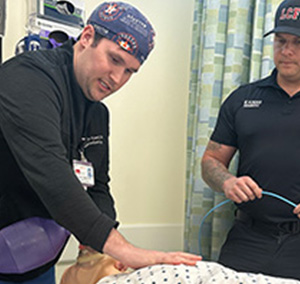 Baylor Maxwell, UTMB Health Anesthesiology resident Two medics practice emergency airway skills