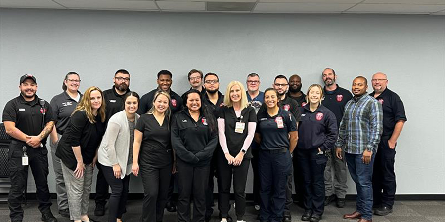 League City EMS medics pose with members of the UTMB Health Stroke team.