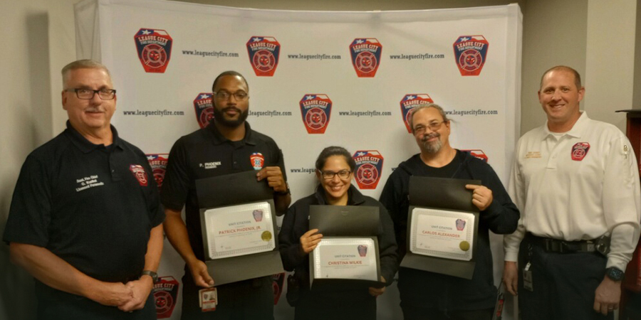 A crew from League City poses with their awards.