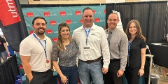 Group of UTMB employees with Justin Wenner, former UTMB patient