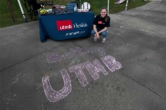 UTMB member drawing with chalk