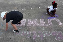 kids drawing with chalk