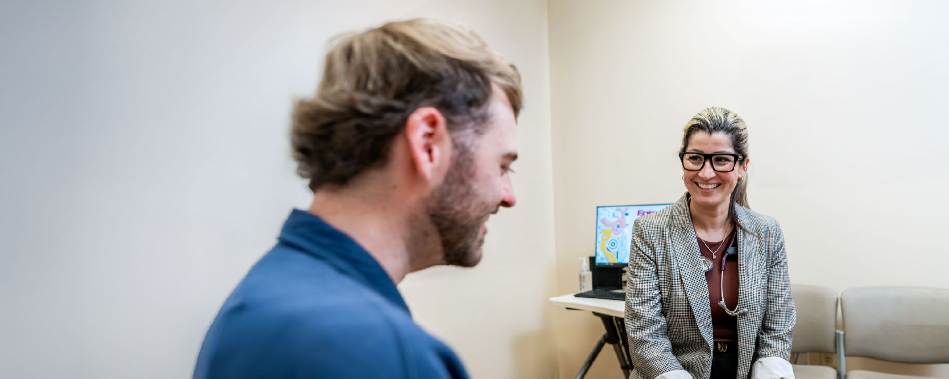 Doctor discussing digestive health with patient.