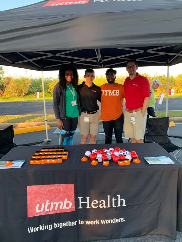 UTMB representatives working first aid station at press run