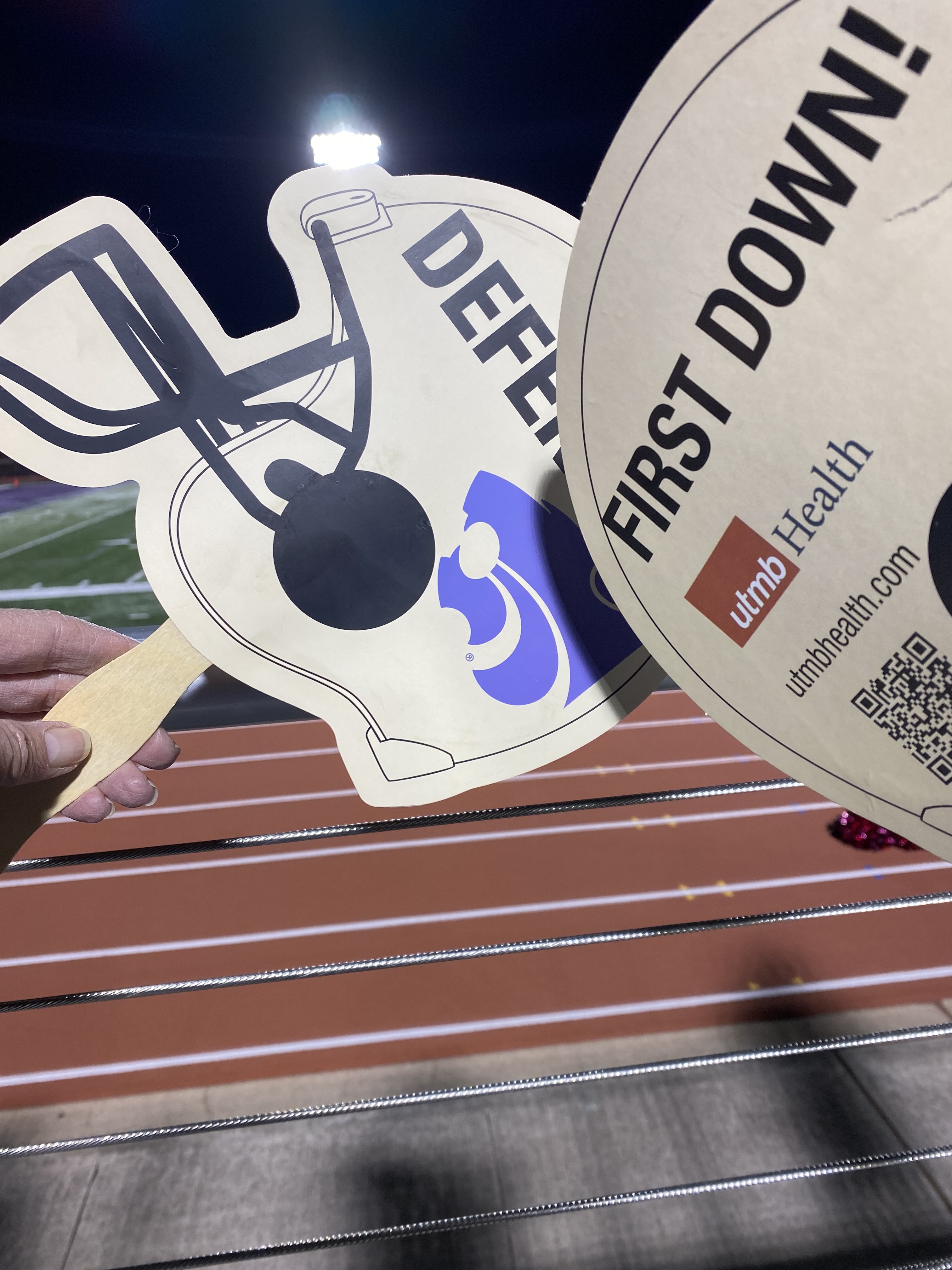 image of two cheer cards at the angleton high school football game