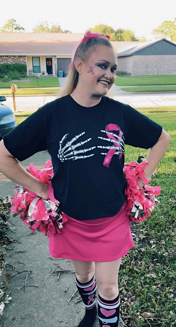 Breast Cancer Survivor Pamela French decked out in spirited pink gear