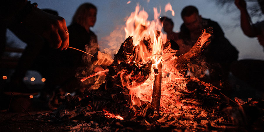 People gathered around a campfire