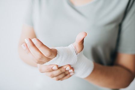 Close up of a woman's wrapped hand