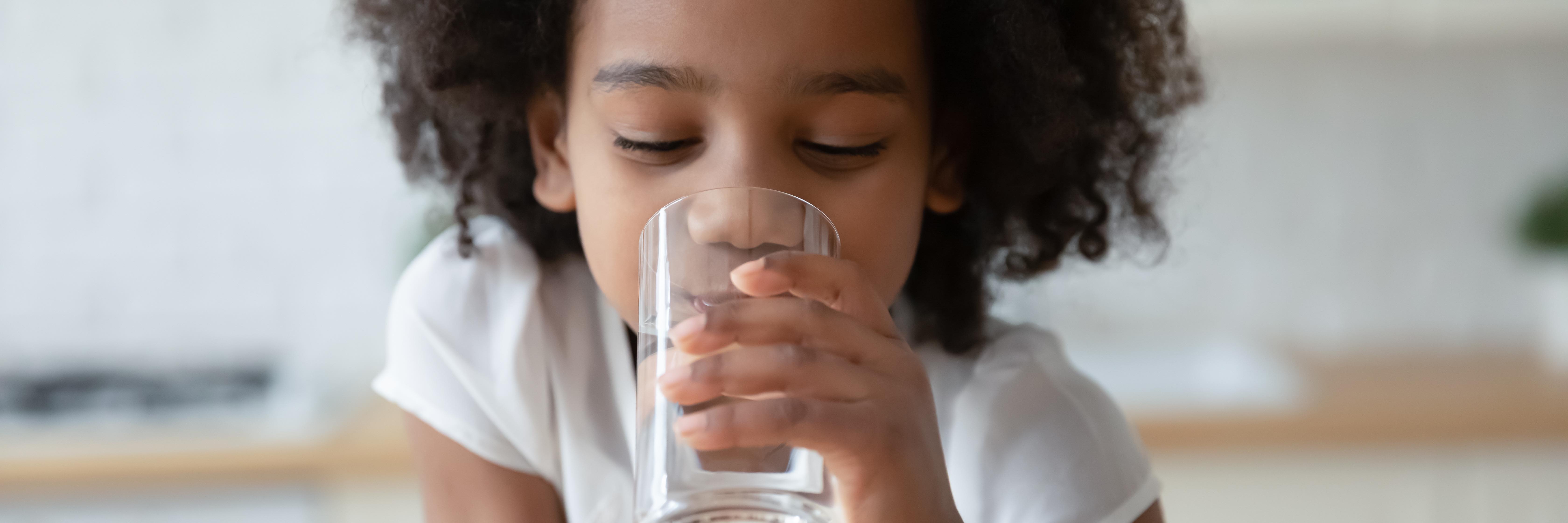 little girl drinking water