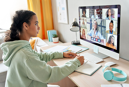 Teen chatting on computer