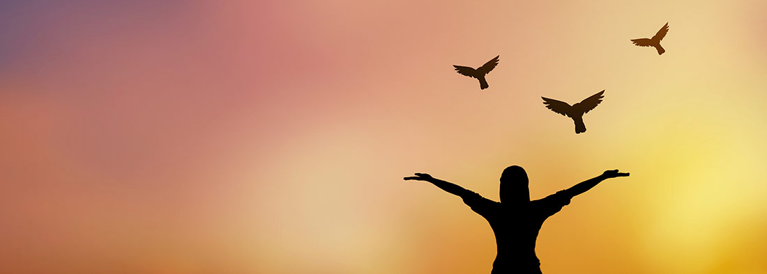 woman releasing dove