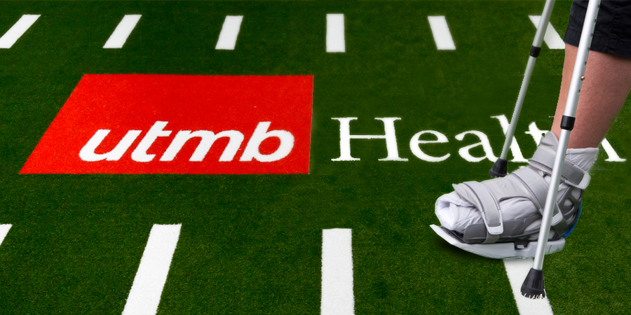 An athlete wearing a medical walking boot and using crutches stands on a sports field with the UTMB Health logo, symbolizing sports injury care and recovery support