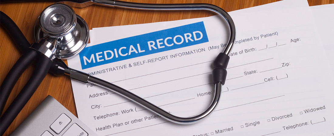 Medical record paper and stethoscope