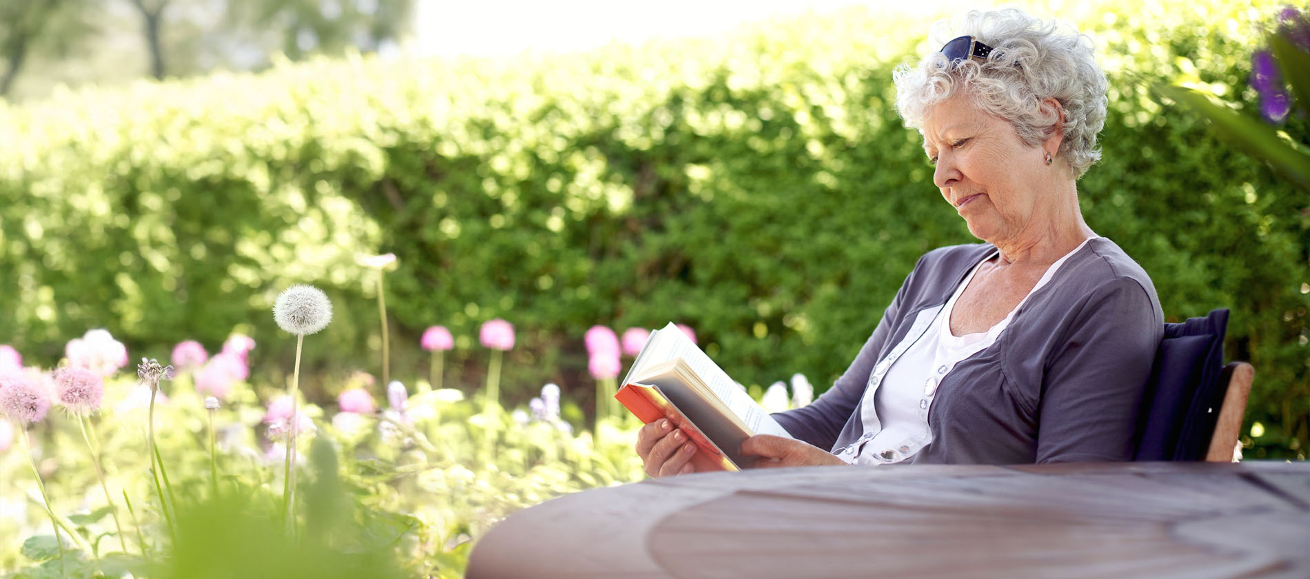 Senior woman reading a book.