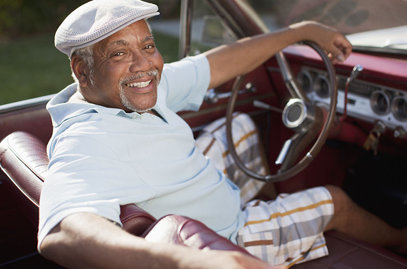 Older man in a car