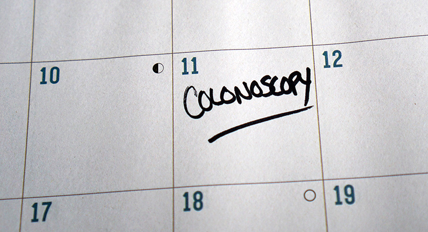 A calendar page with the word ‘colonoscopy’ handwritten on the 11th.”
