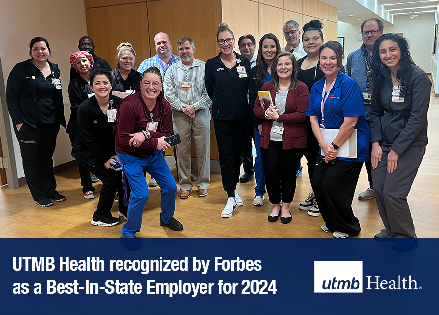 Group of UTMB Health employees standing together in a hallway, with an on‑screen graphic noting recognition by Forbes as a Best‑In‑State Employer for 2024.