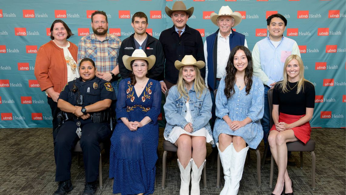 UTMB President's Cabinet Award recipients pose for a photo