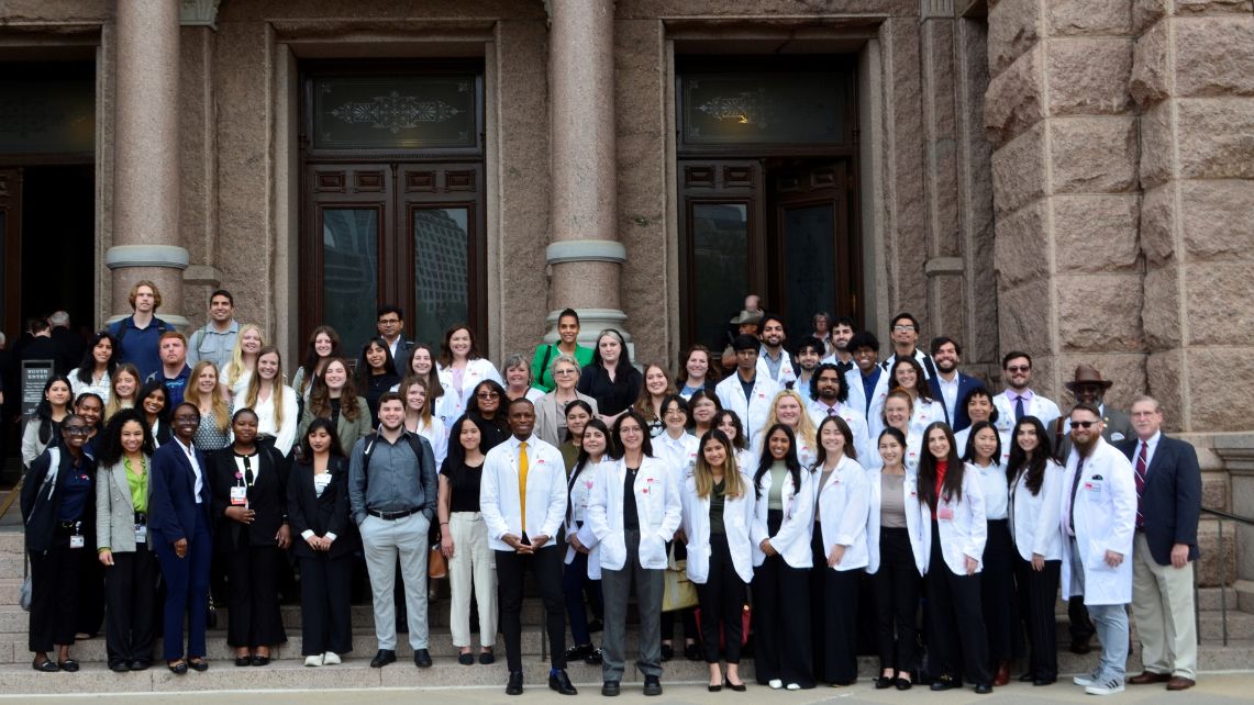 UTMB students pose for a picture in front of the Texas State Capitol