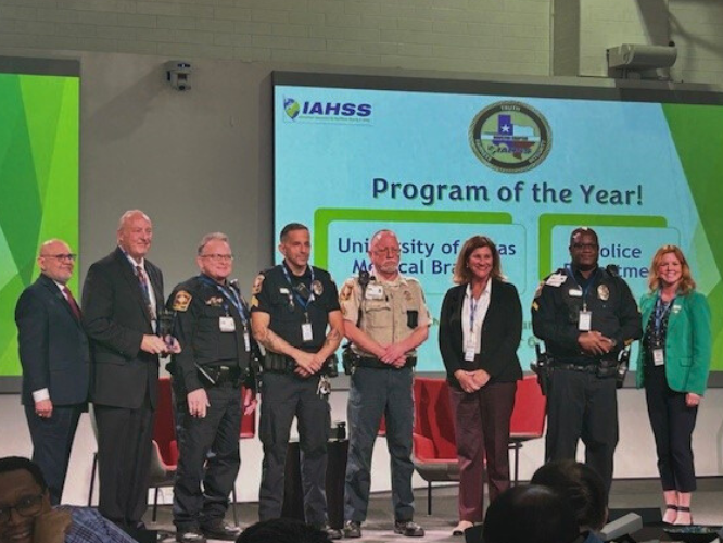 Memebers of the UTMB police department accepting an award