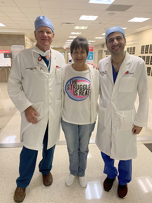 Rebecca Tipton, center, with her doctors, John P. Walker, MD, FACS, and Bilal Farhan, MD.