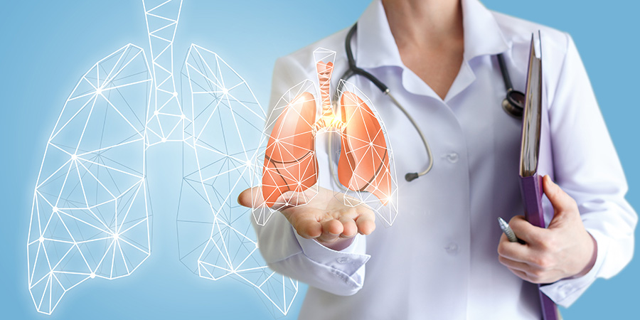doctor holding lung graphic