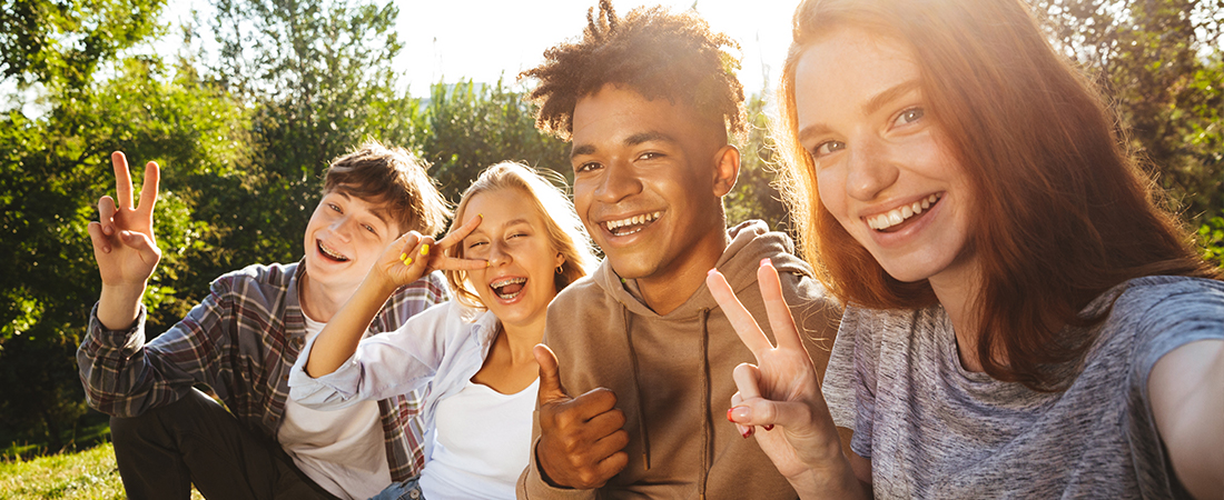 Four teens taking a selfie